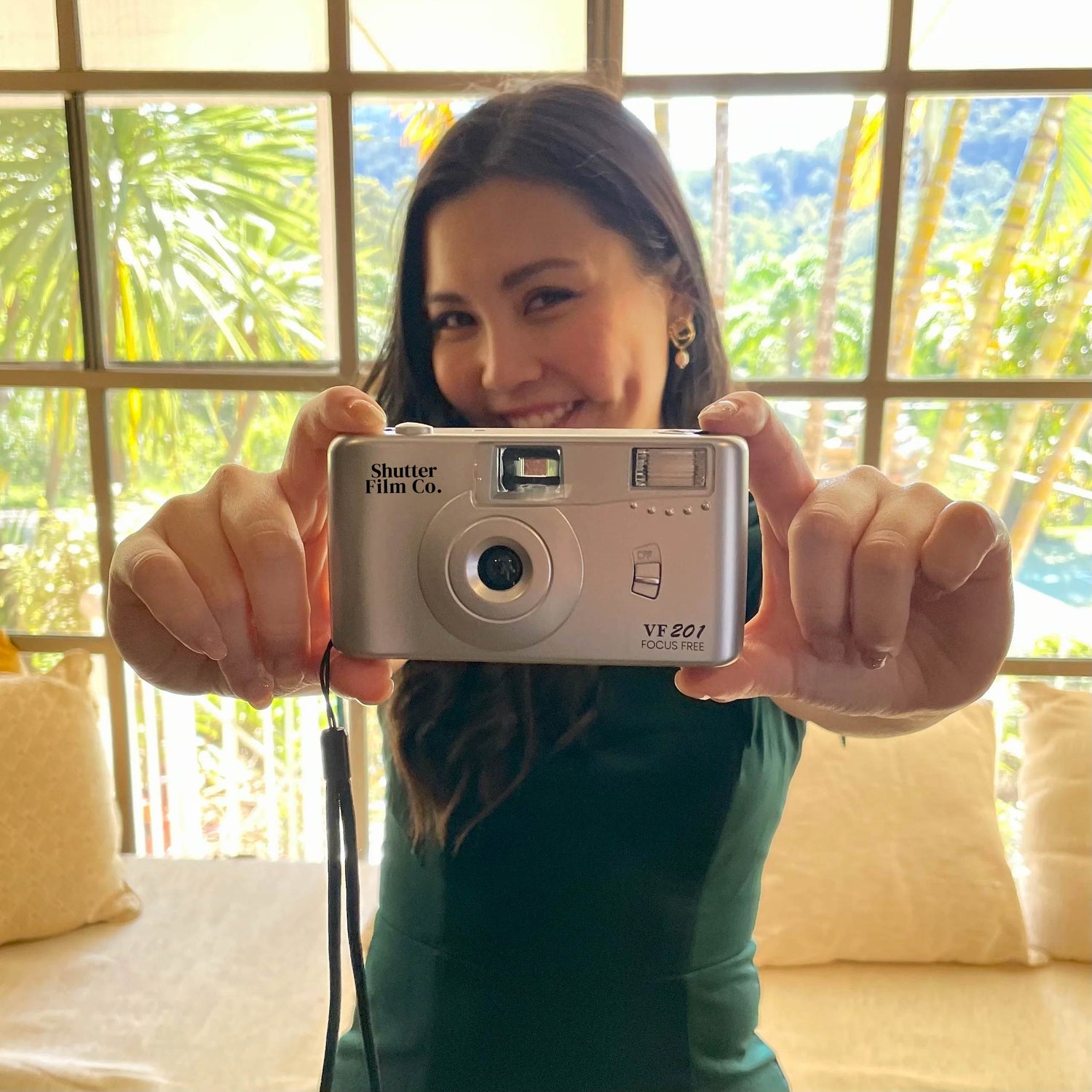 person holding a reusable 35mm film camera in Australia