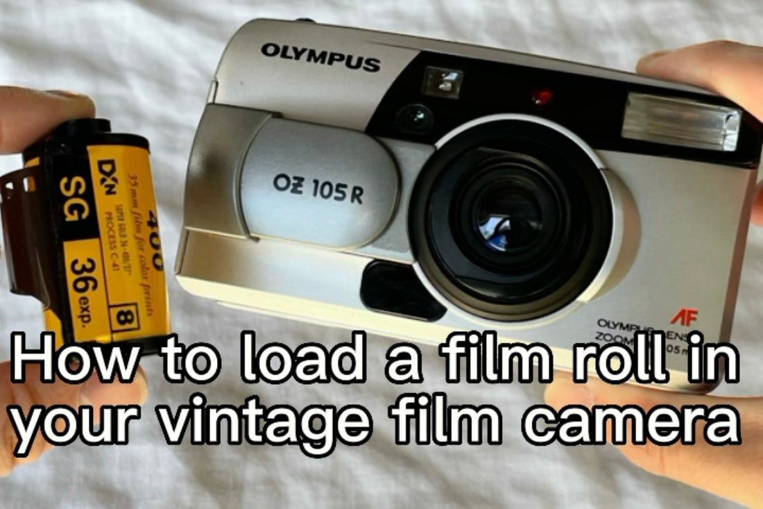 person holding a film camera and film roll to show how to load a vintage film camera